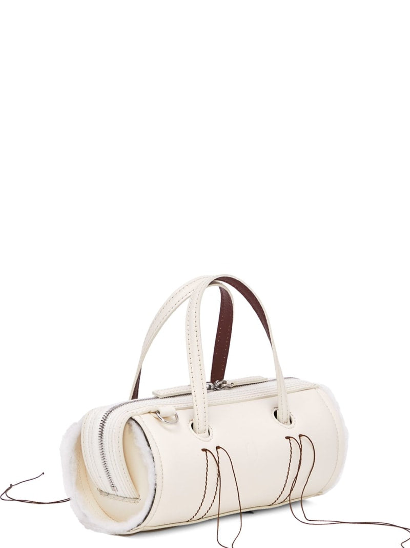 Cream Leather Cylinder Handbag With Decorative Fringe Stitching