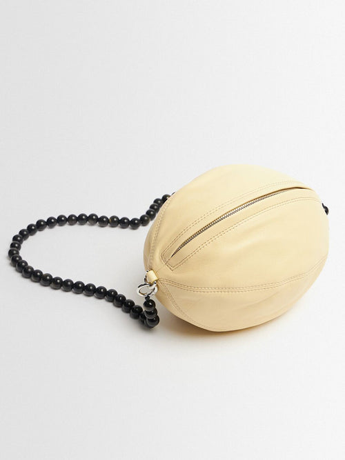 Custard Soft Oval Leather Bag With Fixed Beaded Chain Strap