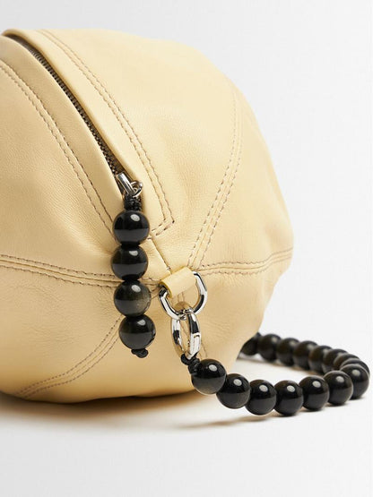 Custard Soft Oval Leather Bag With Fixed Beaded Chain Strap